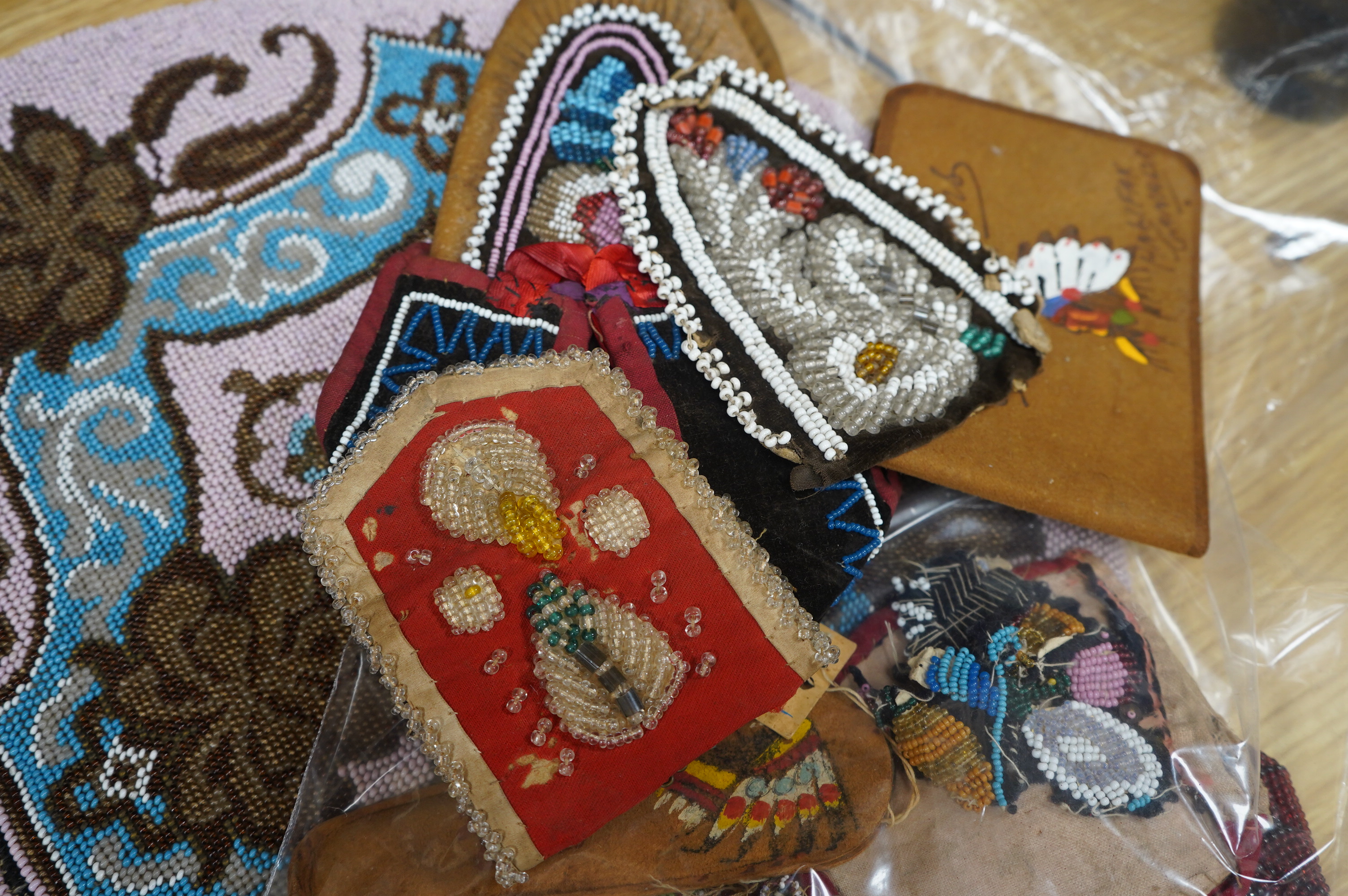 A 19th century unused Berlin beadwork tea cosy, worked in pink, turquoise, brown and white beads, beaded on two sides, the sides still joined. Ideal to convert as a cushion cover or two matching cushion covers, 55cm (tot